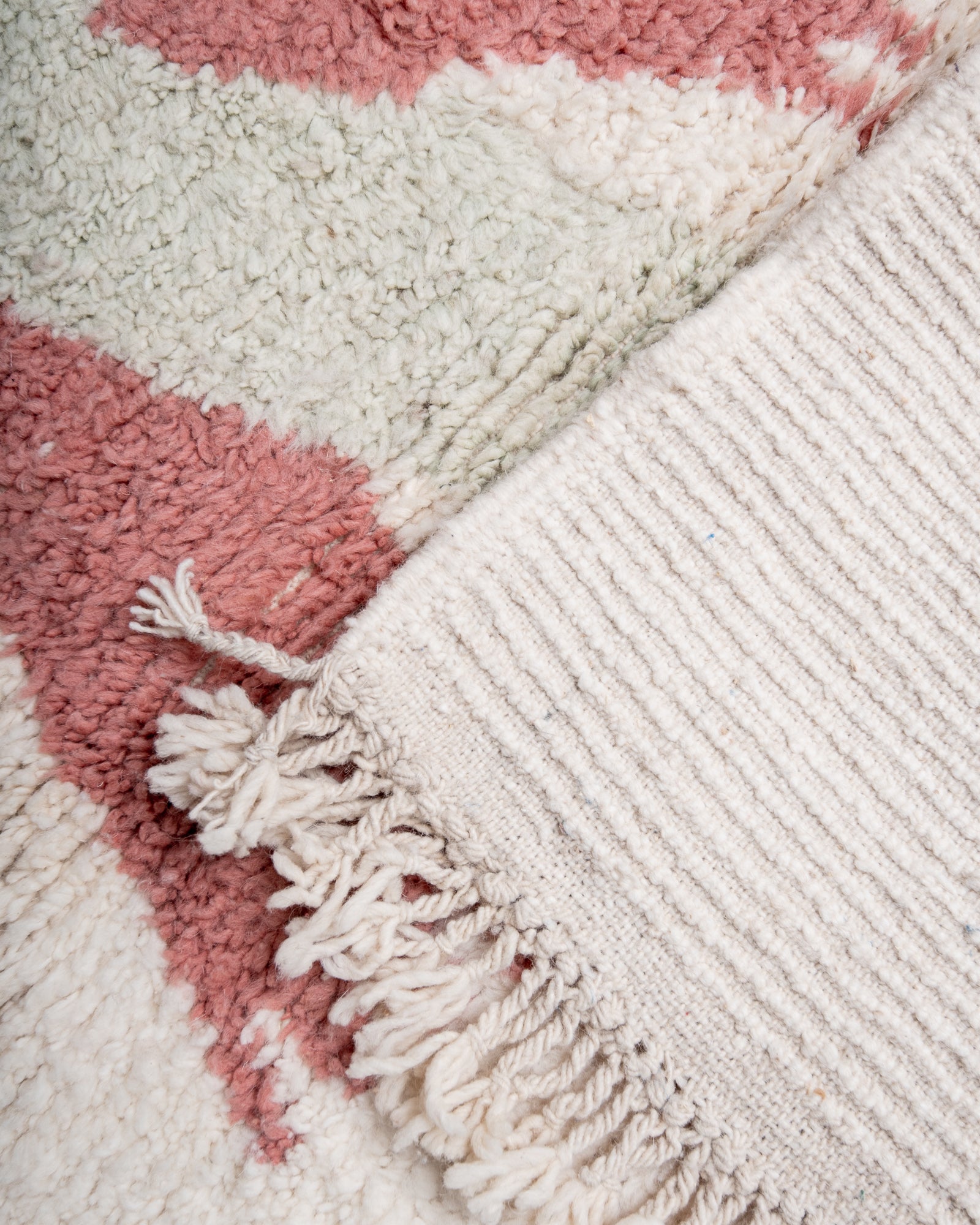 Modern, designer, handcrafted Berber rug from Morocco. Beniourain carpet with beautiful colours and patterns and fluffy wool texture.